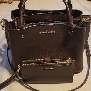Authentic Michael Kors bag and matching wallet.